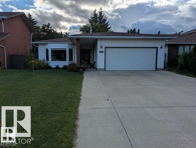 Property Photo:  3718 103B Street NW  AB T6J 2X9 