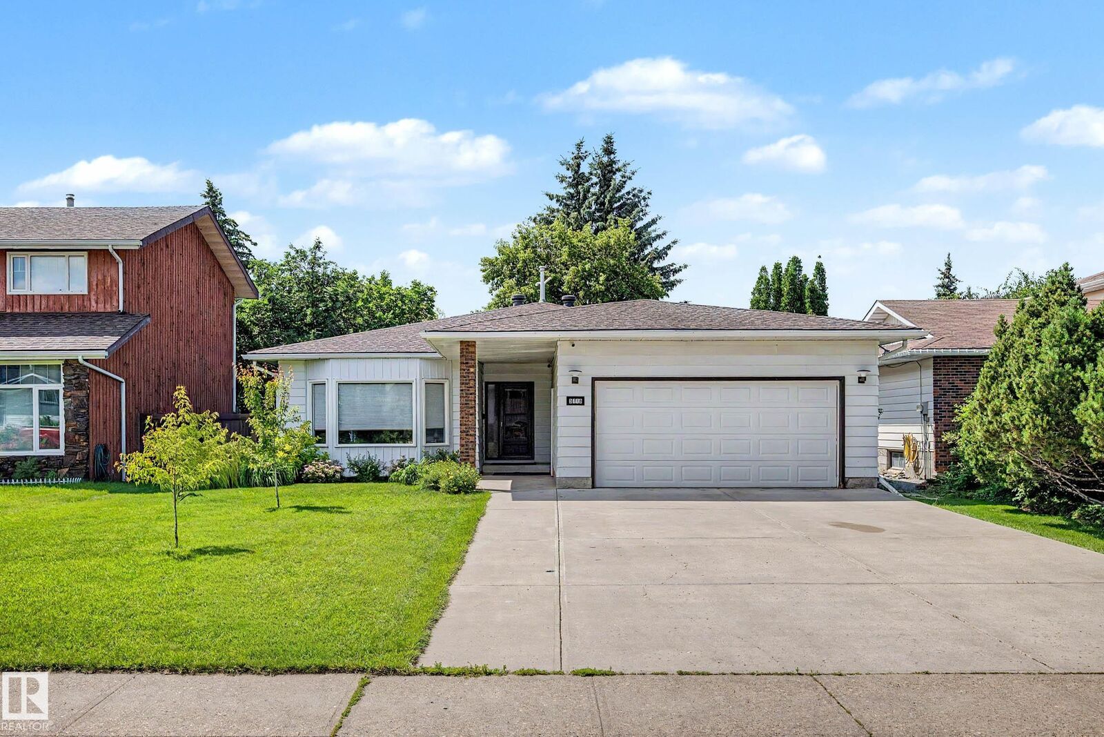 Property Photo: 3718 103B Street NW AB T6J 2X9