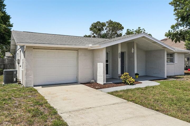 Property Photo:  7215 Mayfield Drive  FL 34668 