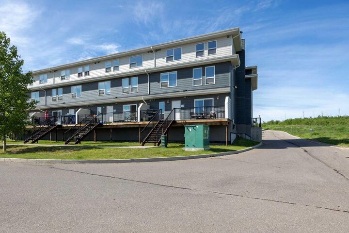 Property Photo: 201 Abasand Drive 618 AB T9J 1L6