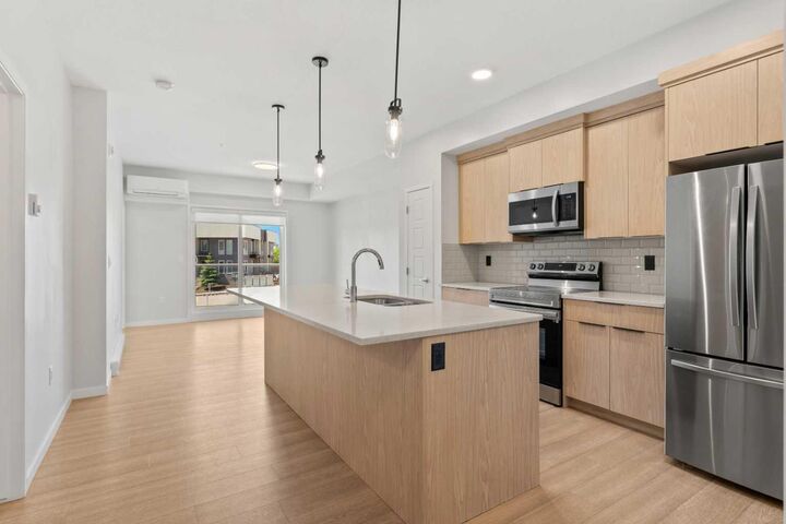 Property Photo: 19489 Main Street SE 2203 AB T3M 3J3