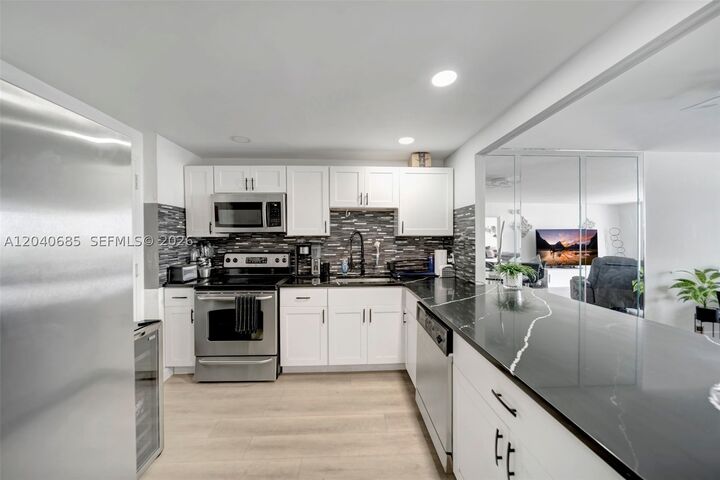 Property Photo:  427 Golden Isles Dr 16H  FL 33009 