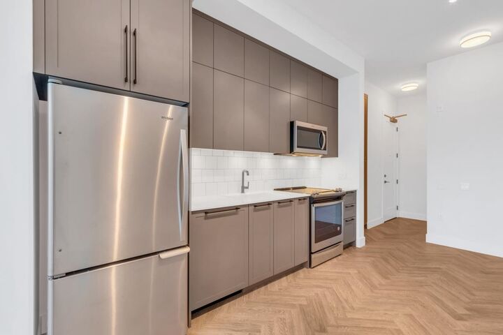 Property Photo:  14968 101A Avenue 310  BC V3R 0T1 