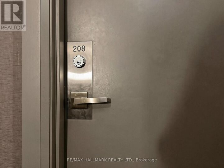 Property Photo: 228 Queens Quay West 208 ON M5J 2X1