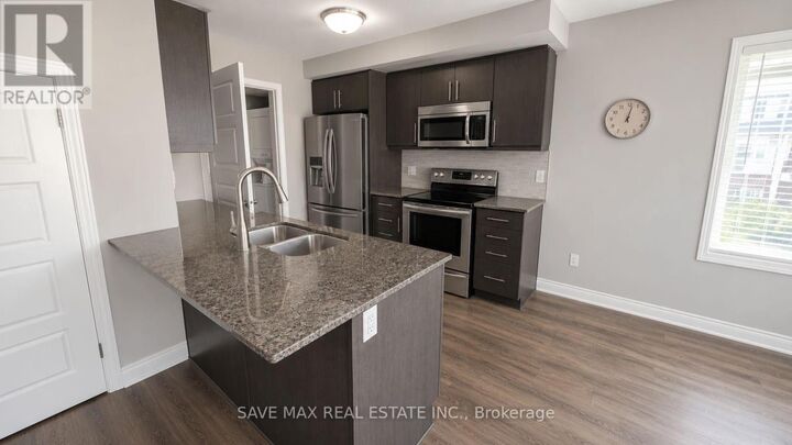 Property Photo:  4 Daylily Lane 12  ON N2R 0L7 