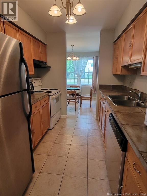 Property Photo:  59 Brentwood Crescent  NB E2K 4S1 