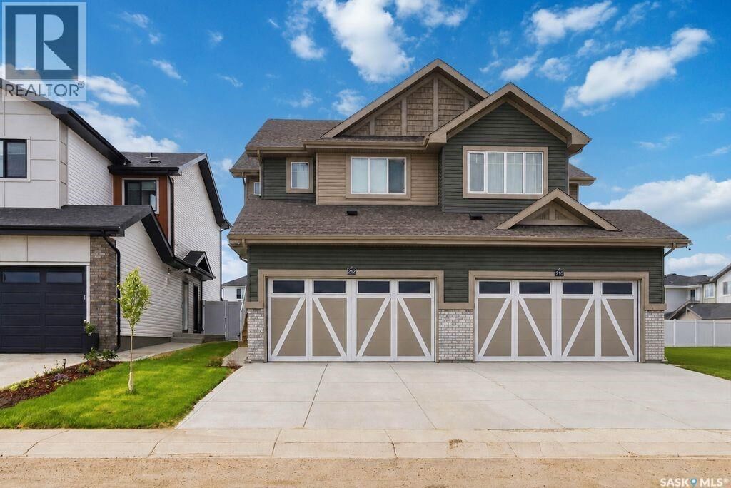 Property Photo: 212 Myles Heidt Lane SK S7W 1J1