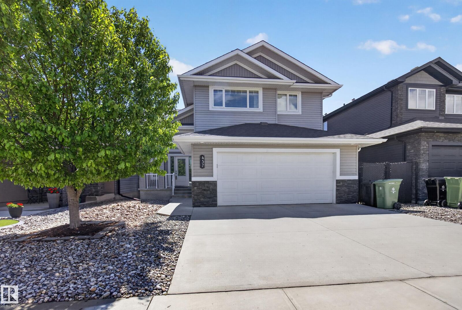 Property Photo:  437 Meadowview Drive  AB T8L 0N9 
