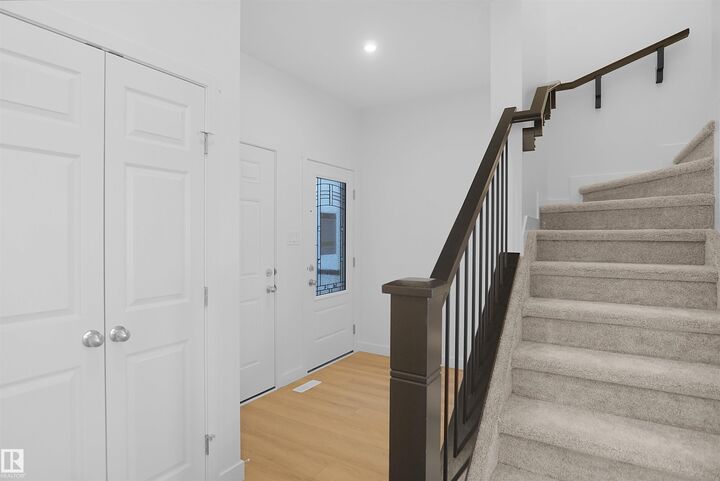Property Photo:  20928 16 Avenue NW  AB T6W 5G7 