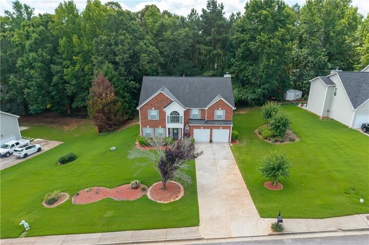Property Photo:  1835 Winding Crossing Trail  GA 30213 