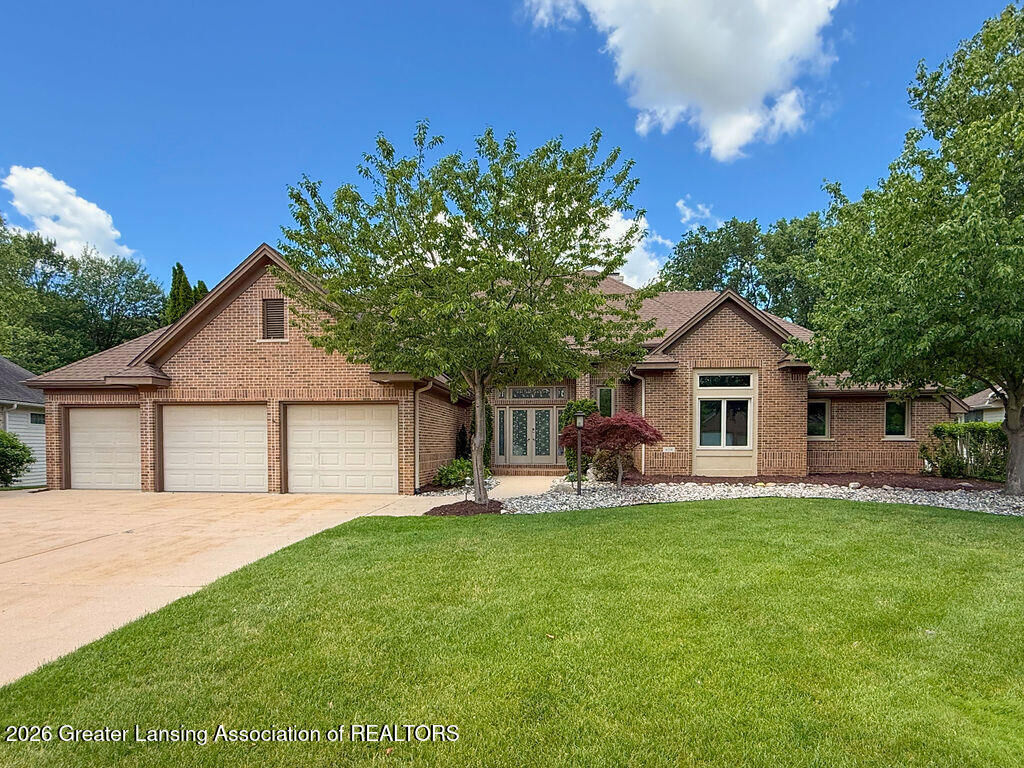 Property Photo:  404 W Spring Meadows Lane  MI 48820 