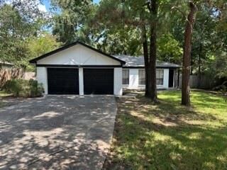 Property Photo: 24 E Bigelow Oak Court TX 77381