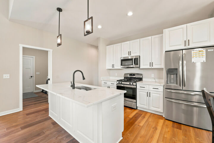 Property Photo:  1291 Carolyn Blvd  WI 53050 
