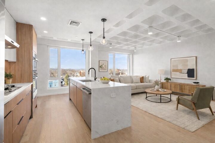 Property Photo:  125 Lowell Street 603  MA 02143 