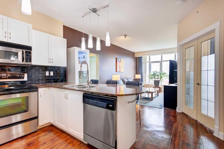 Property Photo:  11811 Lake Fraser Drive SE 6504  AB T2J 7J4 