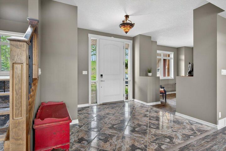 Property Photo: 274136 272 Street W AB T2J 2T9