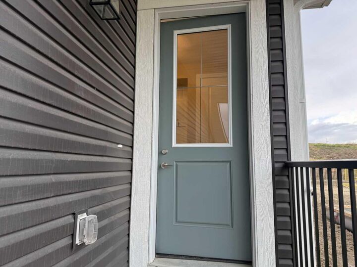 Property Photo: 147 Sundown Crescent AB T4C 1Y3