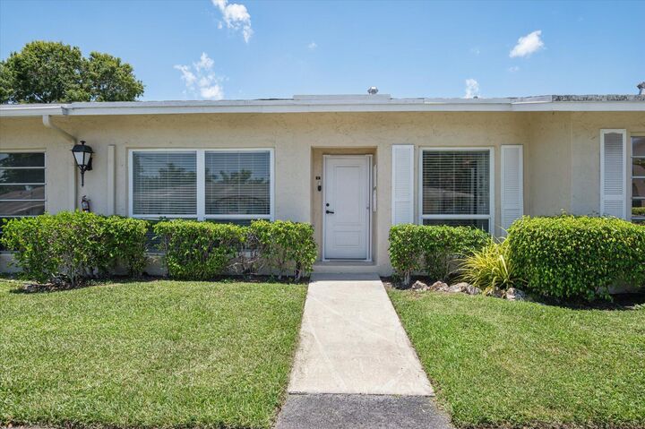 Property Photo:  13725 Flora Place C  FL 33484 