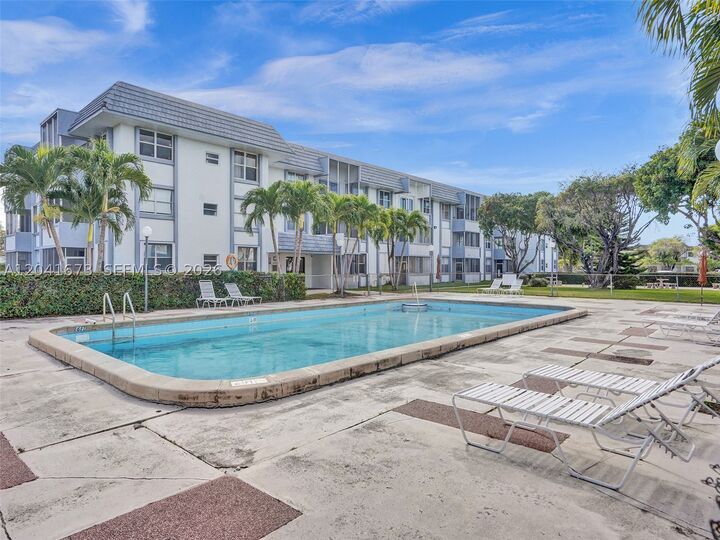 Property Photo:  6705 NW 169th St C112  FL 33015 