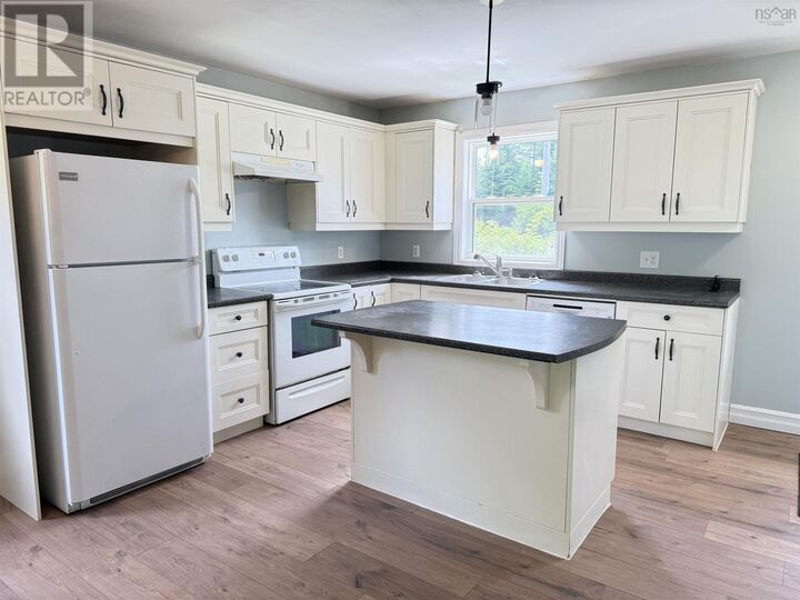 Property Photo:  711 Pleasant Street  NS B2W 1A8 