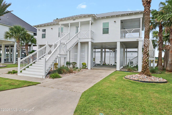 Property Photo:  10157 S River Drive  MS 39532 