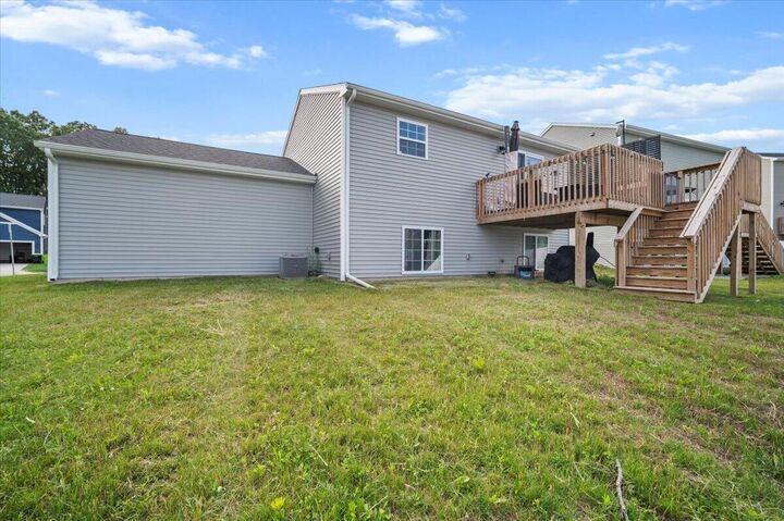 Property Photo:  808 Hollyhock Drive  MI 48838 