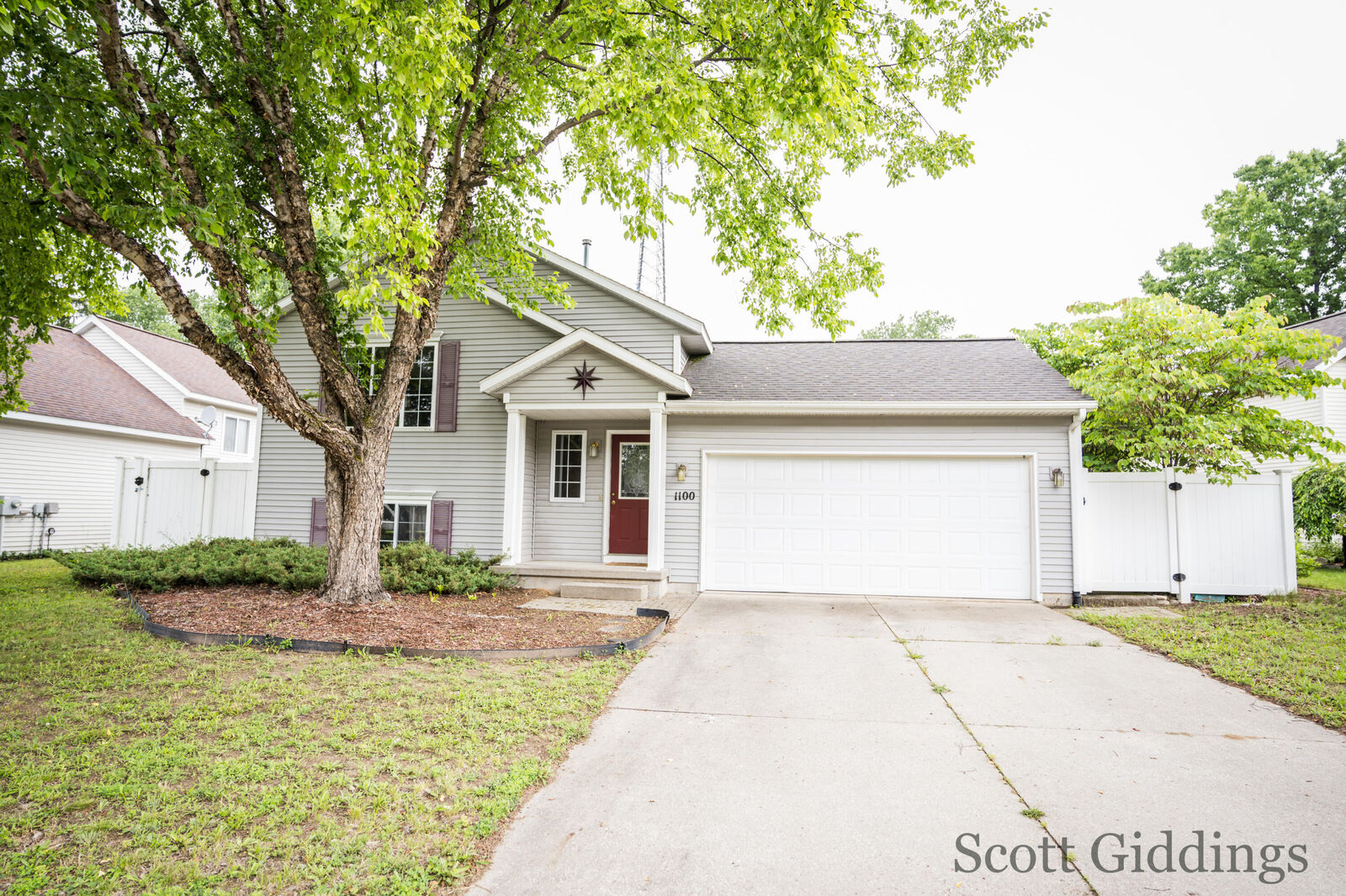 Property Photo:  1100 Sprucewood Drive  MI 48838 