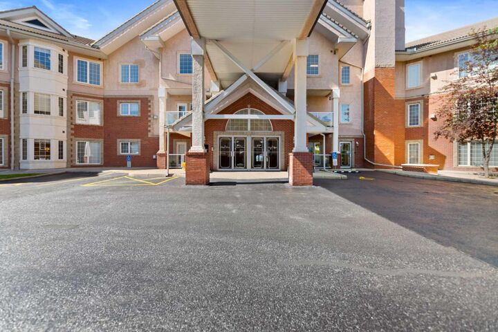 Property Photo:  223 Tuscany Springs Boulevard NW 117  AB T3L 2M2 
