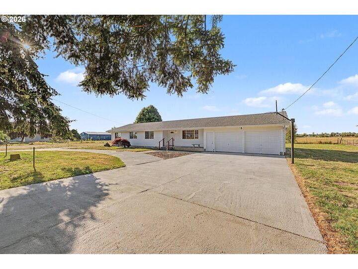 Property Photo:  8757 Parr Rd  OR 97026 