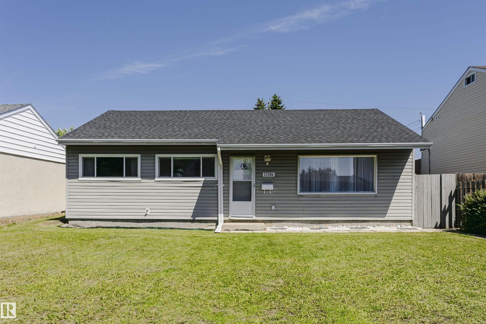 Property Photo:  13104 128 Avenue NW  AB T5L 3H2 