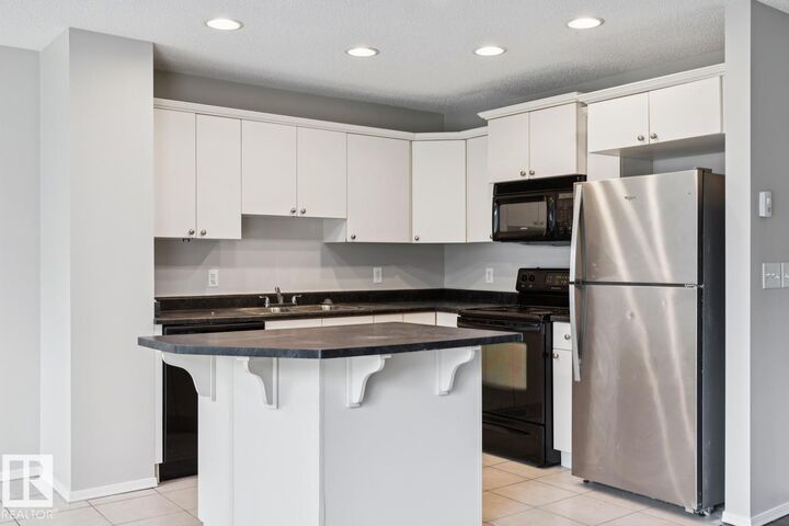 Property Photo:  9035 Scott Crescent NW  AB T6R 0E8 