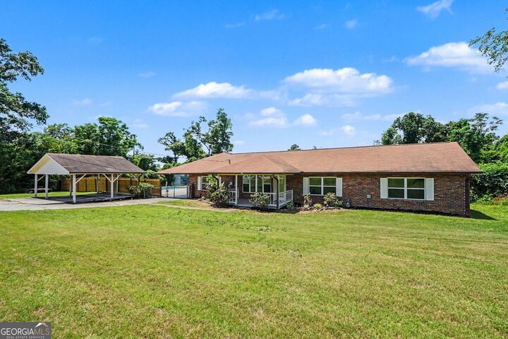 Property Photo:  961 McDaniel Mill Road SW  GA 30094 