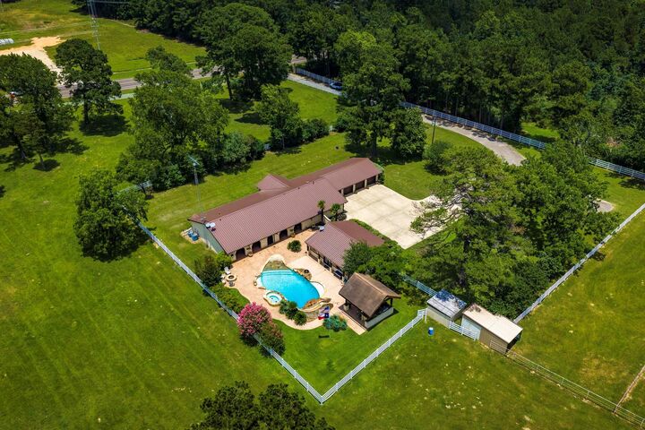 Property Photo:  838 State Highway 150  TX 77358 
