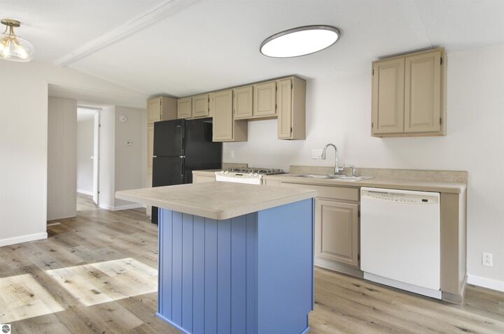Property Photo:  202 Jenny Lind Street  MI 49688 