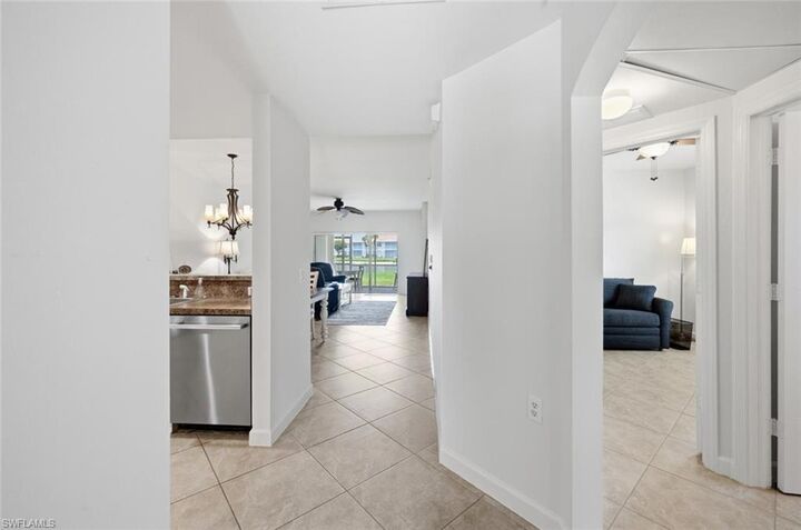 Property Photo:  3033 Driftwood Way 3407  FL 34109 