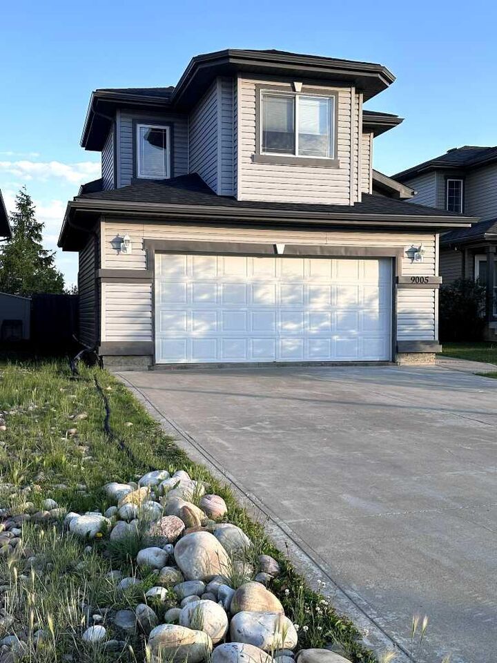 Property Photo:  9005 94A Avenue  AB T8X 0A2 