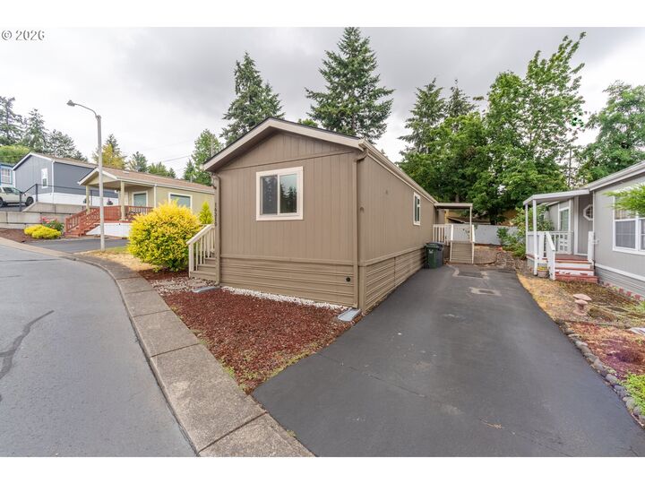 Property Photo:  16310 SE 84th Ave  OR 97267 