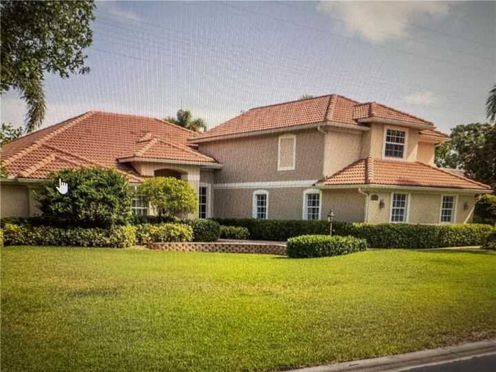 Property Photo:  5220 Rosewood Lane  FL 32966 