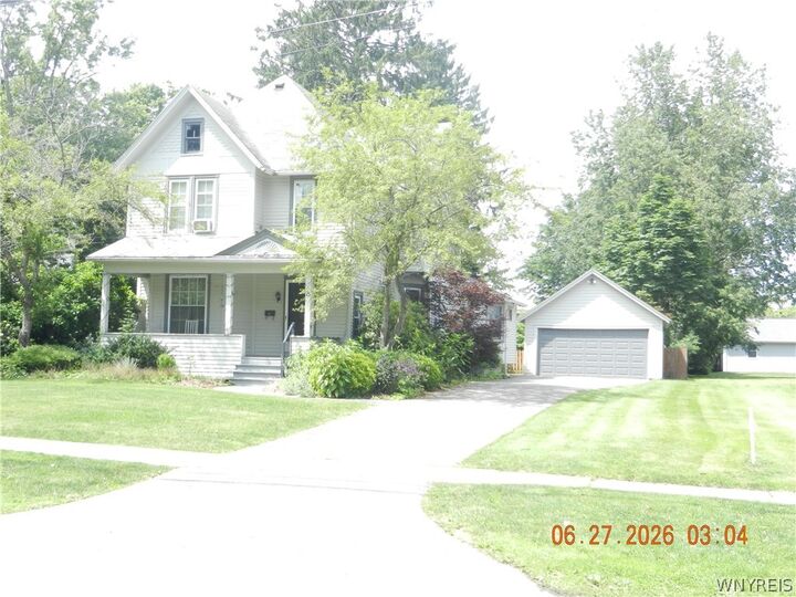 Property Photo:  75 Maple Ave  NY 14075 