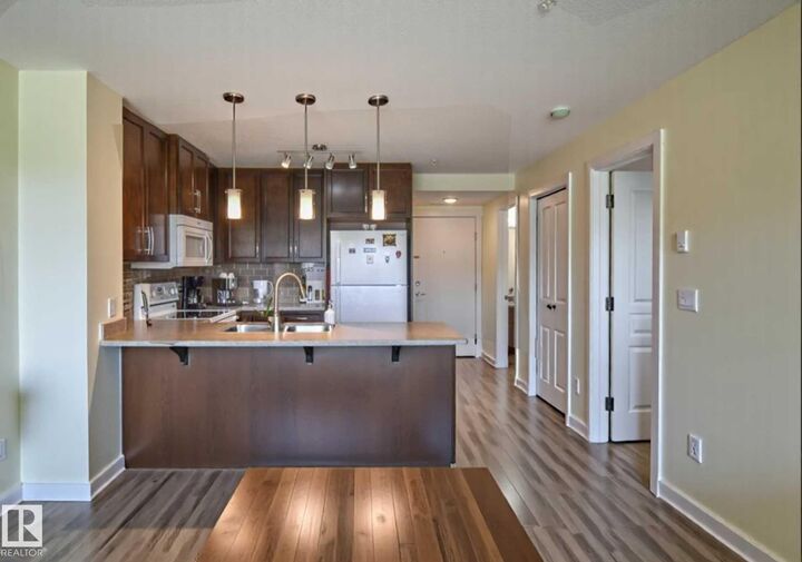 Property Photo:  3670 139 Avenue NW 210  AB T5Y 3N5 