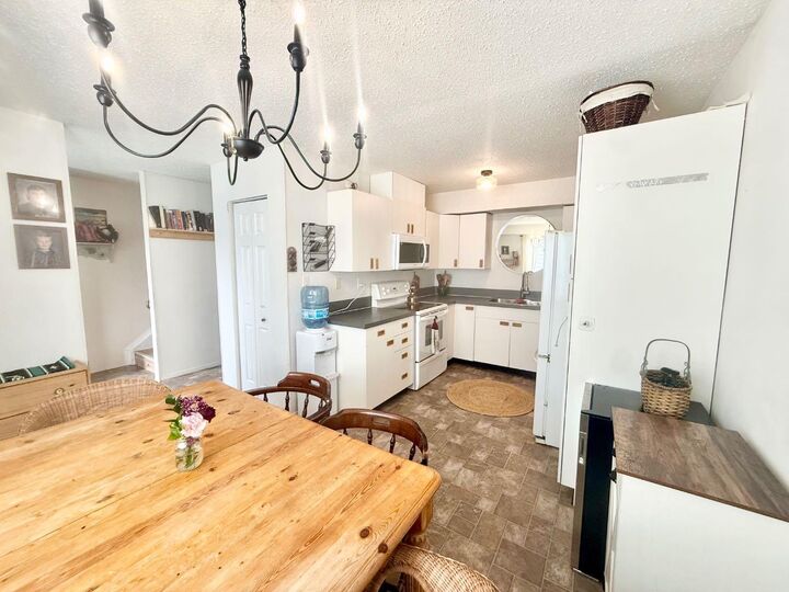 Property Photo: 457 Collinge Road 318 AB T7V 1K8
