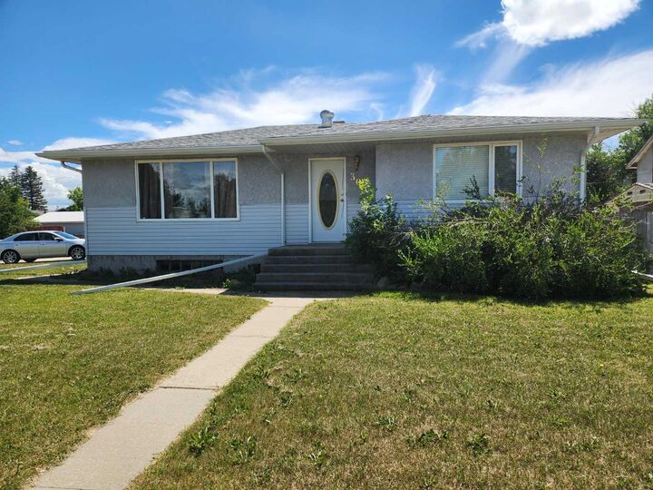 Property Photo: 303 2 Avenue AB T0K 2K0