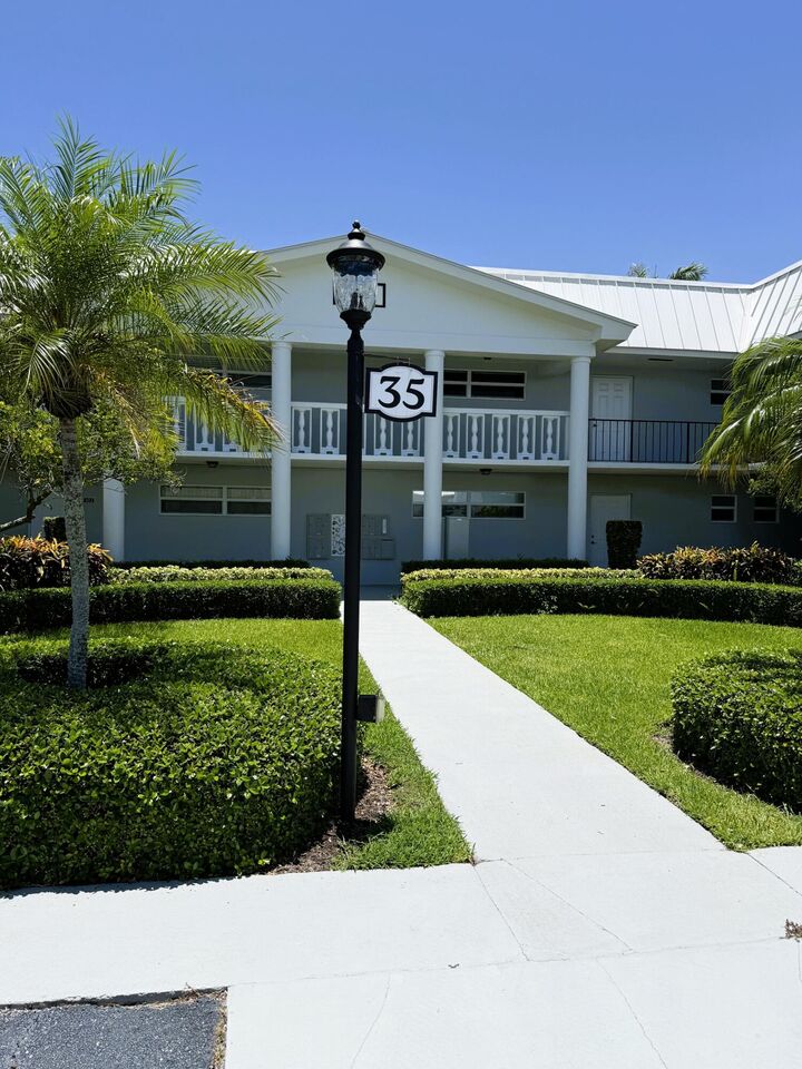 Property Photo:  35 Colonial Club Drive 203  FL 33435 
