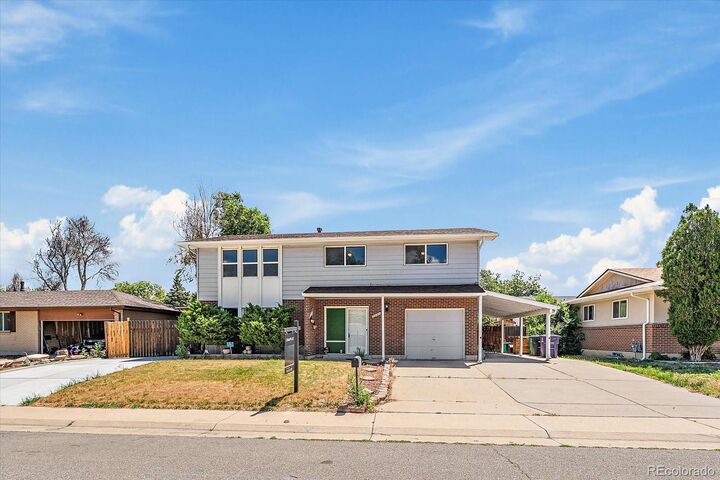 Property Photo:  5042 Scranton Street  CO 80239 