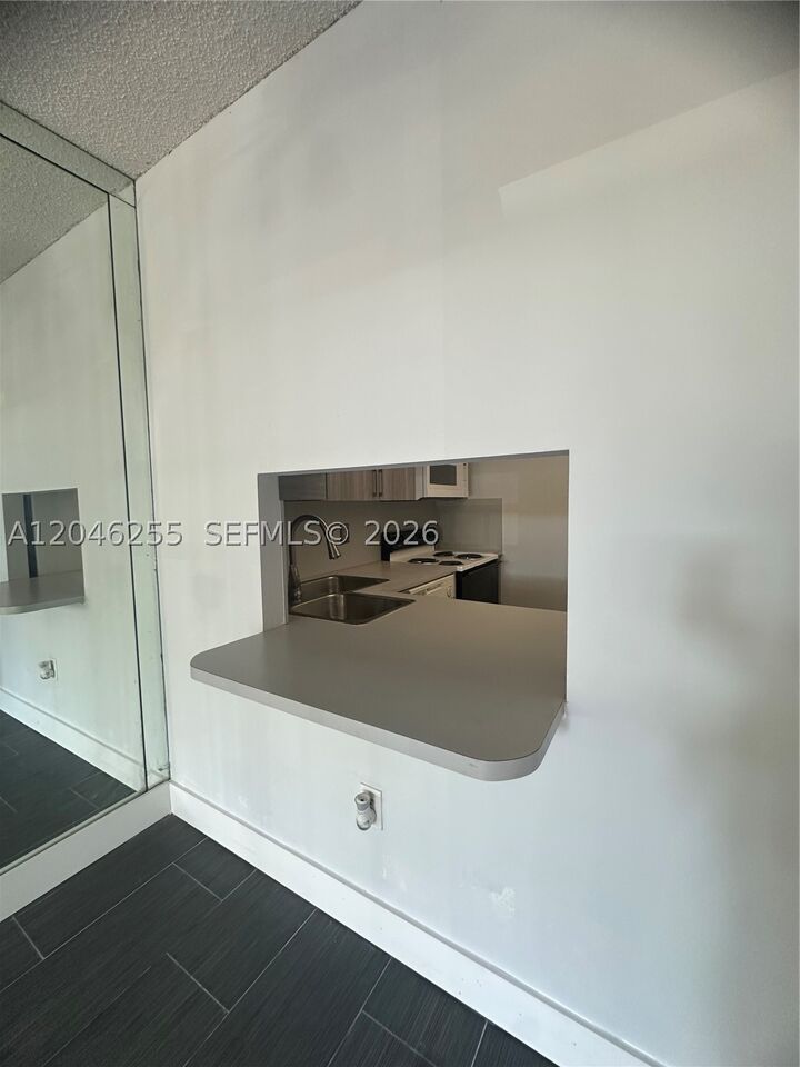 Property Photo:  1470 NE 123rd St A104  FL 33161 