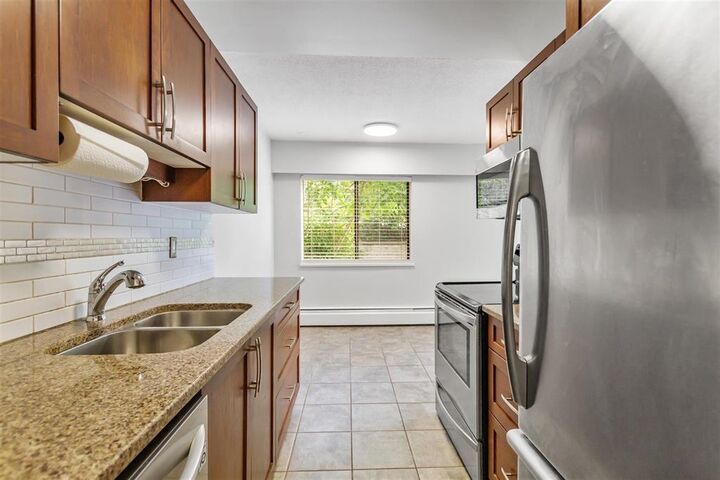 Property Photo: 590 Whiting Way 112 BC V3J 3R9