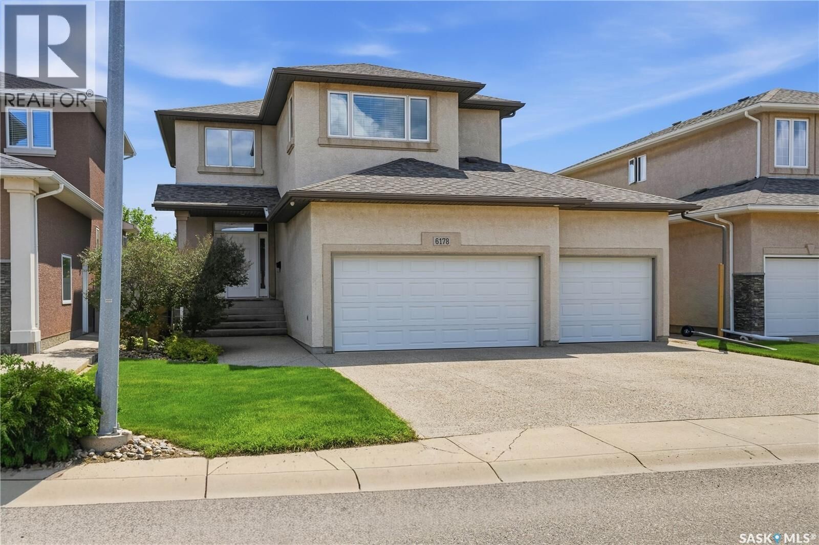 Property Photo: 6178 Wascana Court Way SK S4V 3E8