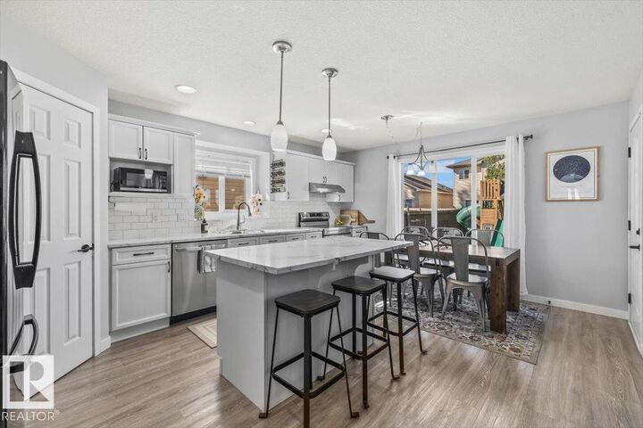 Property Photo:  9722 87 St  AB T8R 1V2 