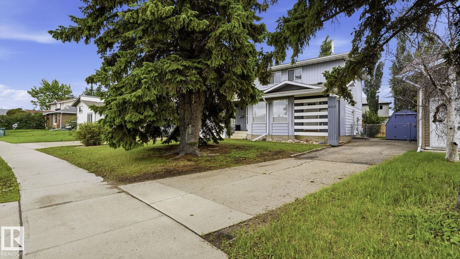 Property Photo:  4301 44 Street  AB T4X 1C7 