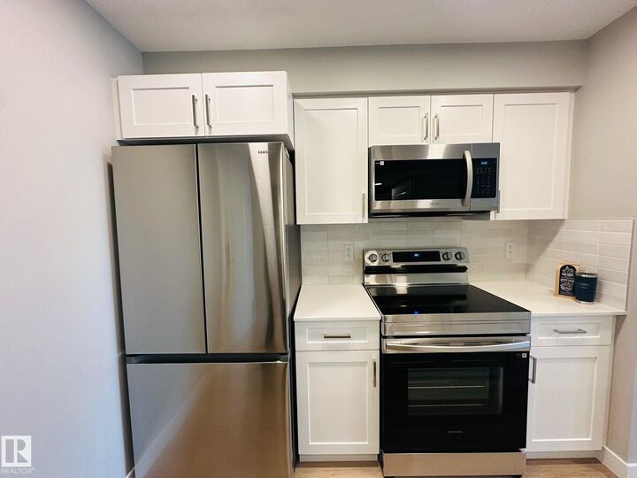 Property Photo:  1506 Tamarack Boulevard NW 320  AB T6T 2J5 